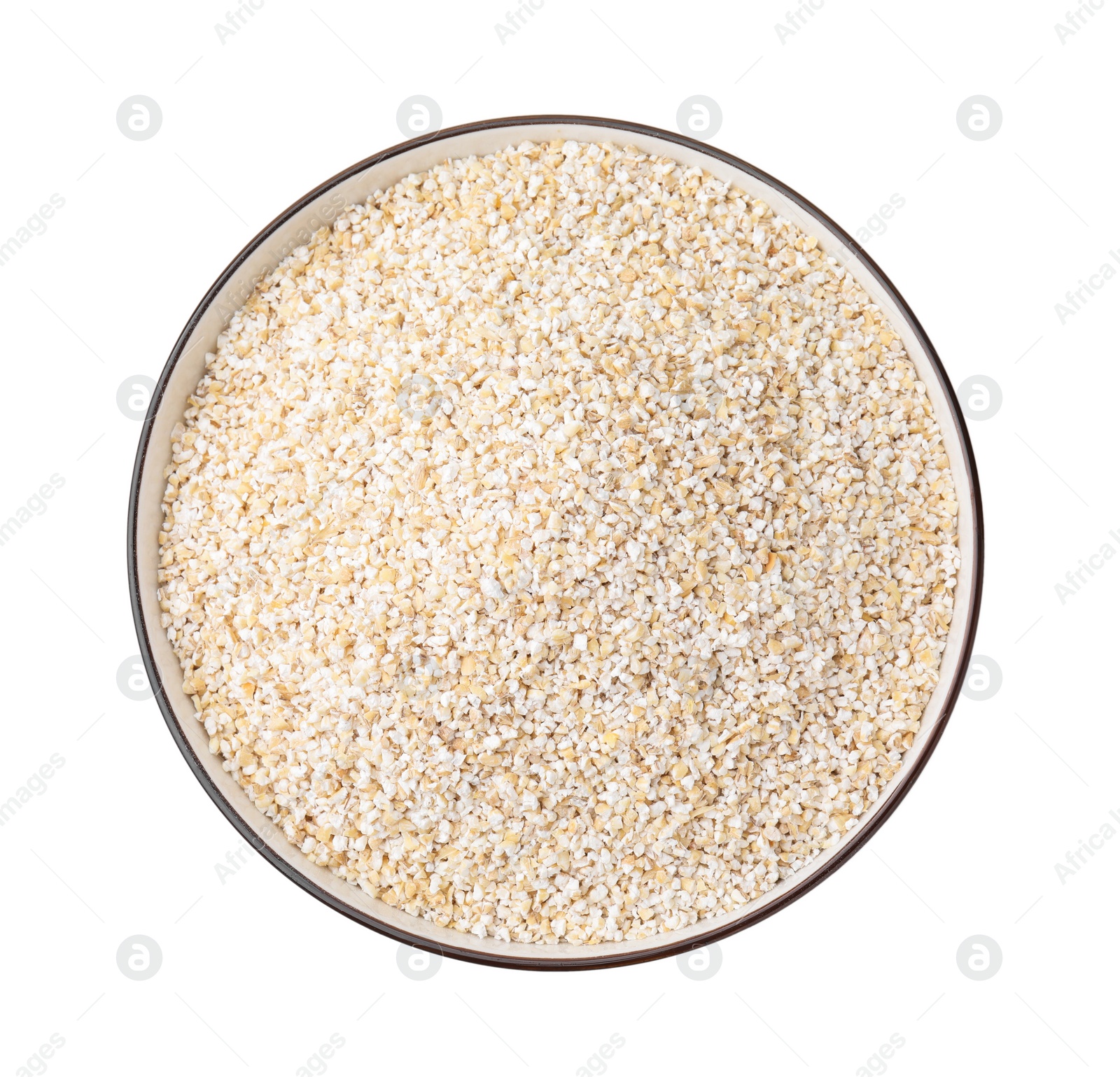 Photo of Raw barley groats in bowl isolated on white, top view