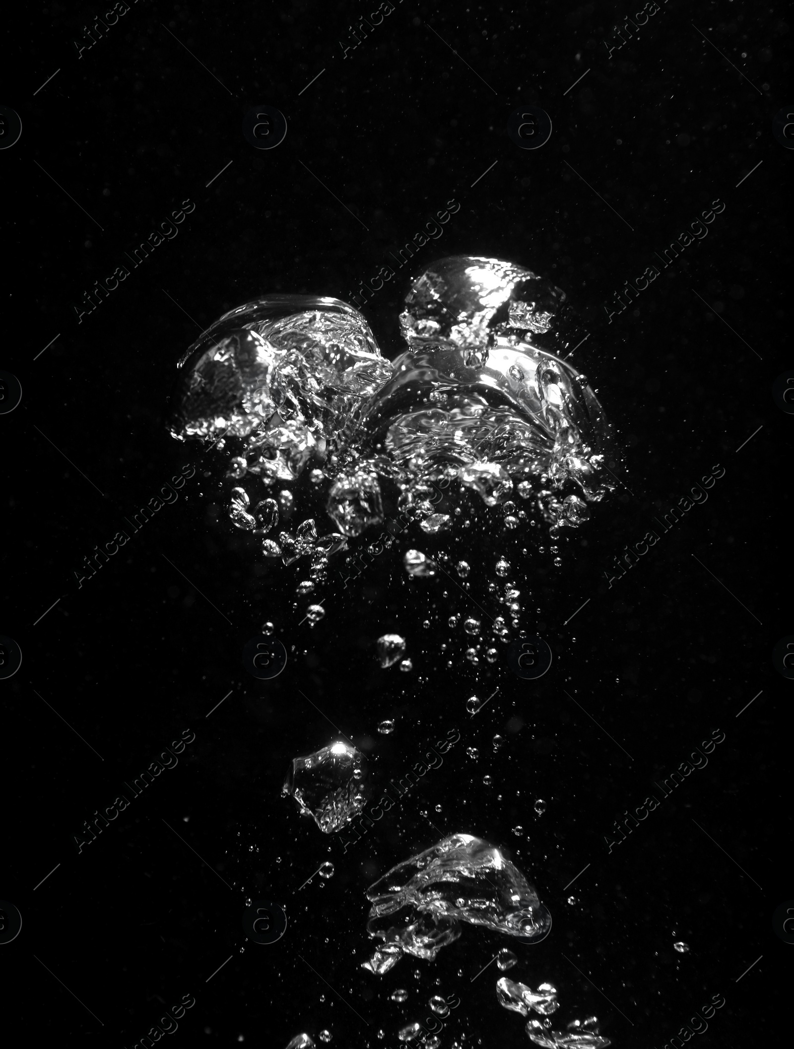 Photo of Air bubbles in water on black background