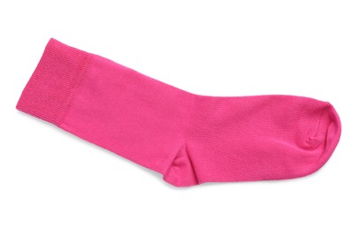 Photo of New pink sock isolated on white, top view. Footwear accessory