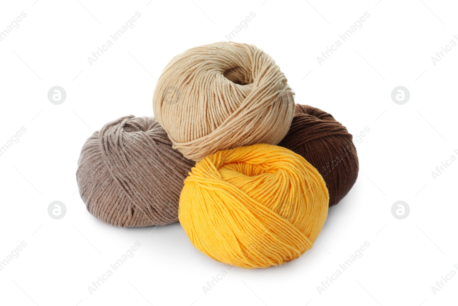 Photo of Soft colorful woolen yarns on white background