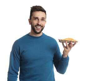 Man with French fries on white background