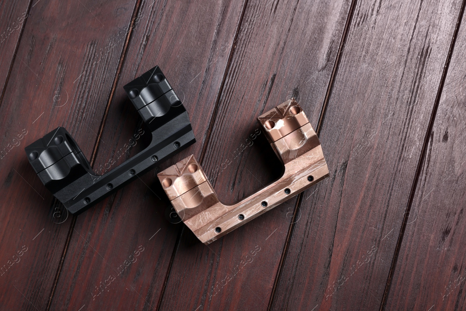 Photo of Quick disconnect sniper cantilever scope mounts on wooden table, top view