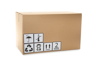 Photo of Cardboard box with shipping label isolated on white