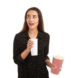 Emotional woman with popcorn and beverage during cinema show on white background