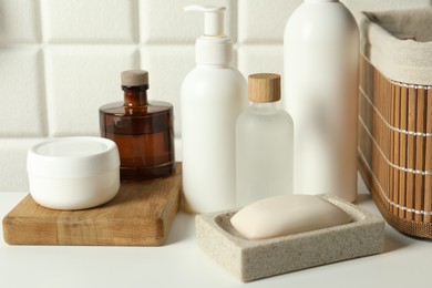 Photo of Bath accessories. Personal care products on white table, closeup