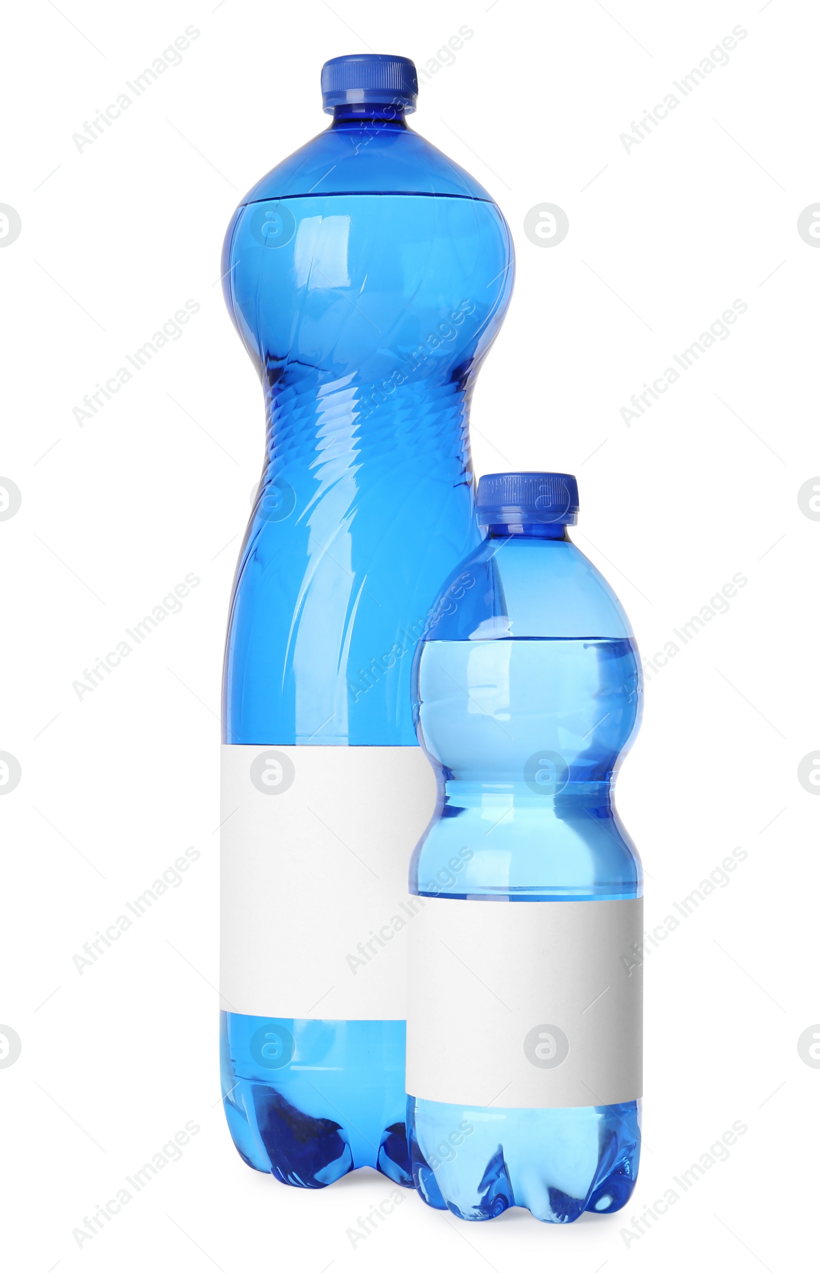 Image of Bottles of pure water with blank labels on white background