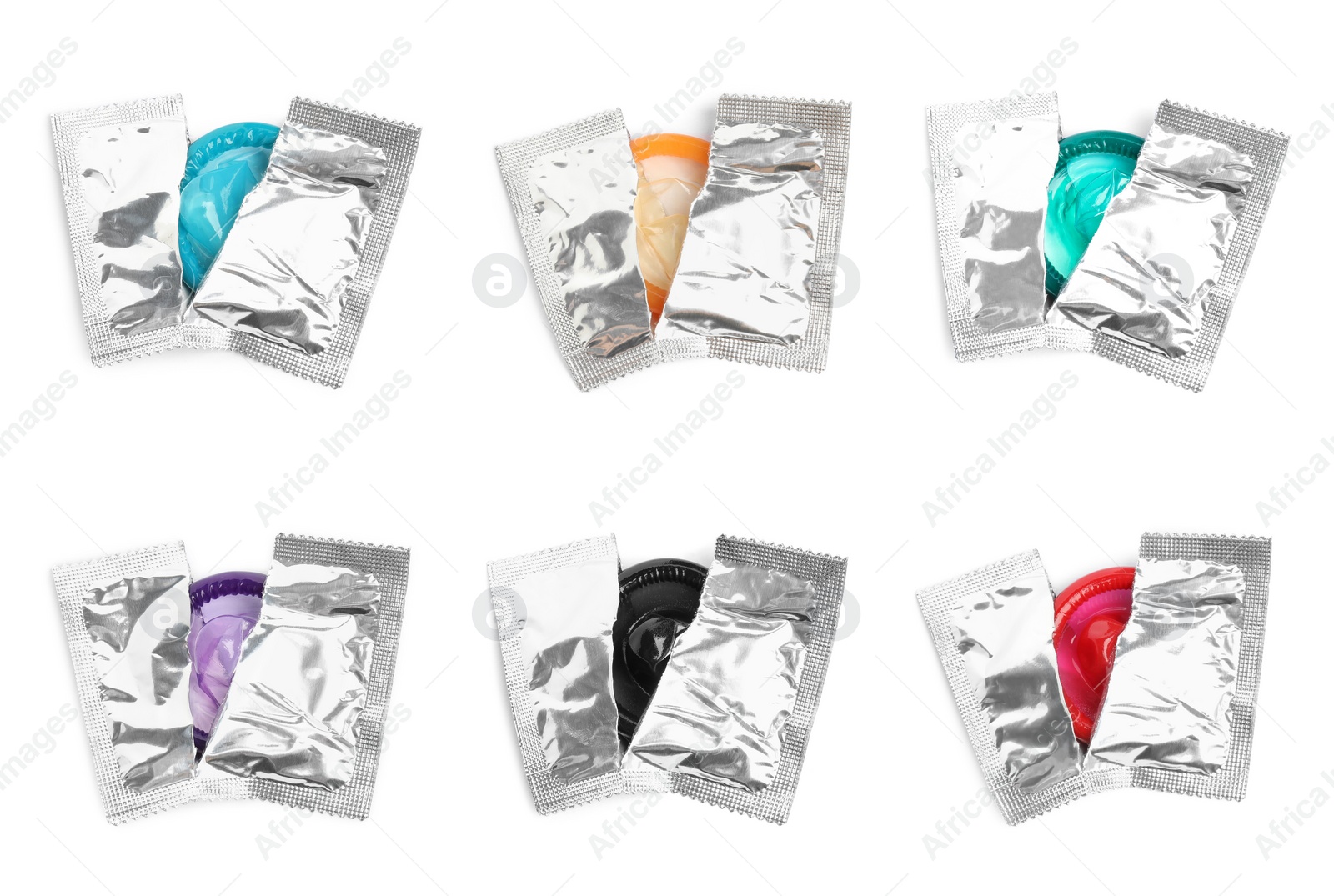 Image of Set with condoms in torn packages on white background, top view 