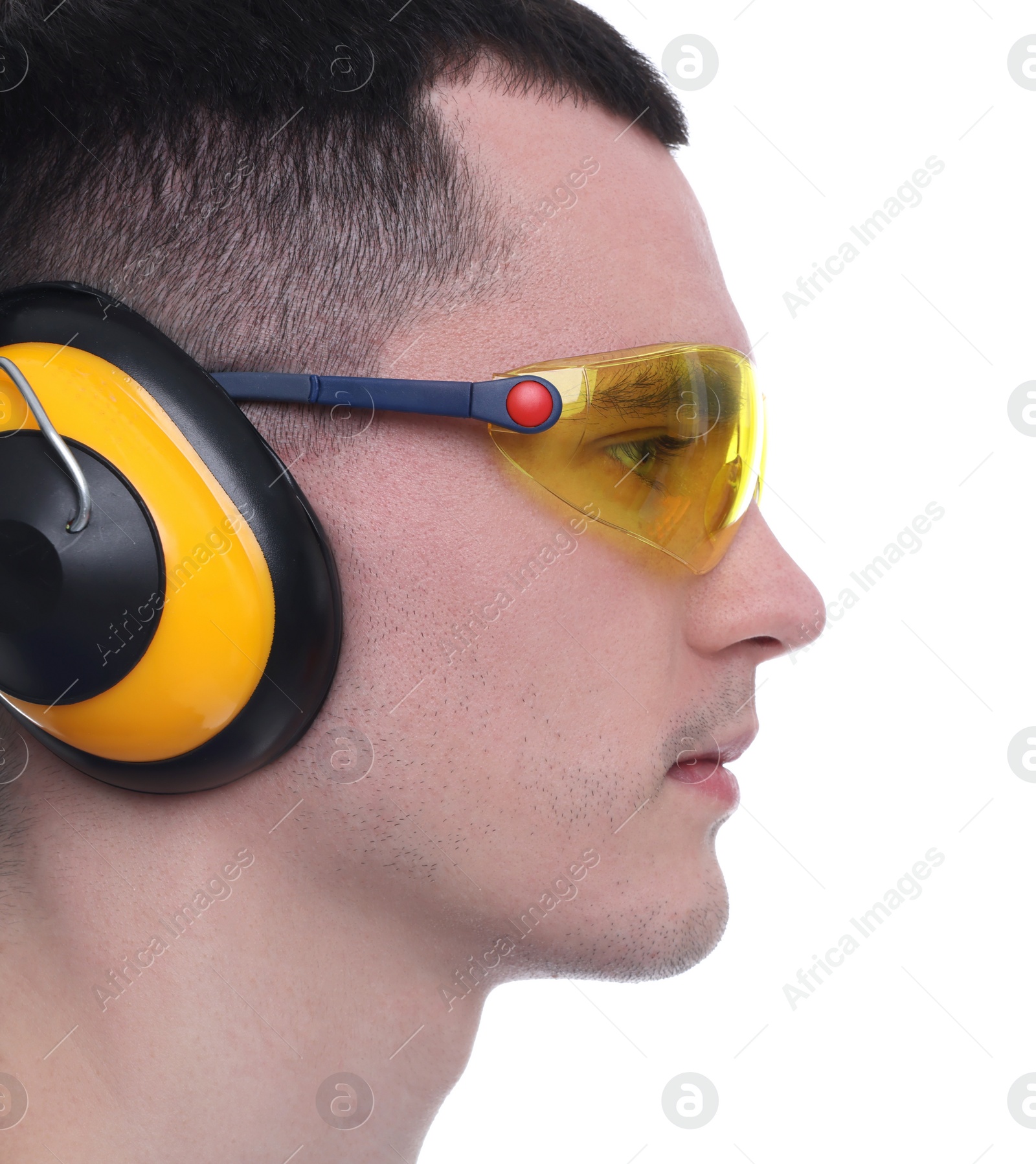 Photo of Young man wearing safety equipment on white background