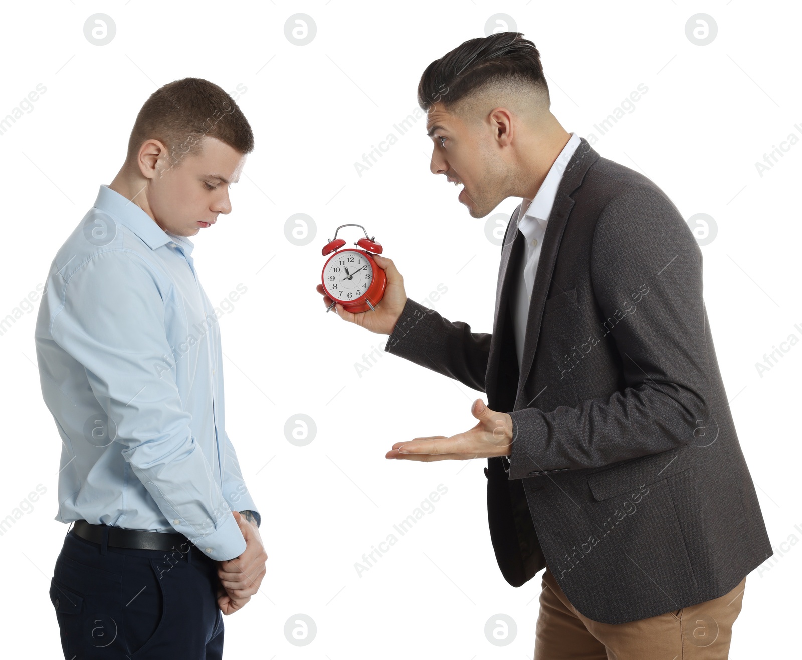 Photo of Businessman with alarm clock scolding employee for being late on white background