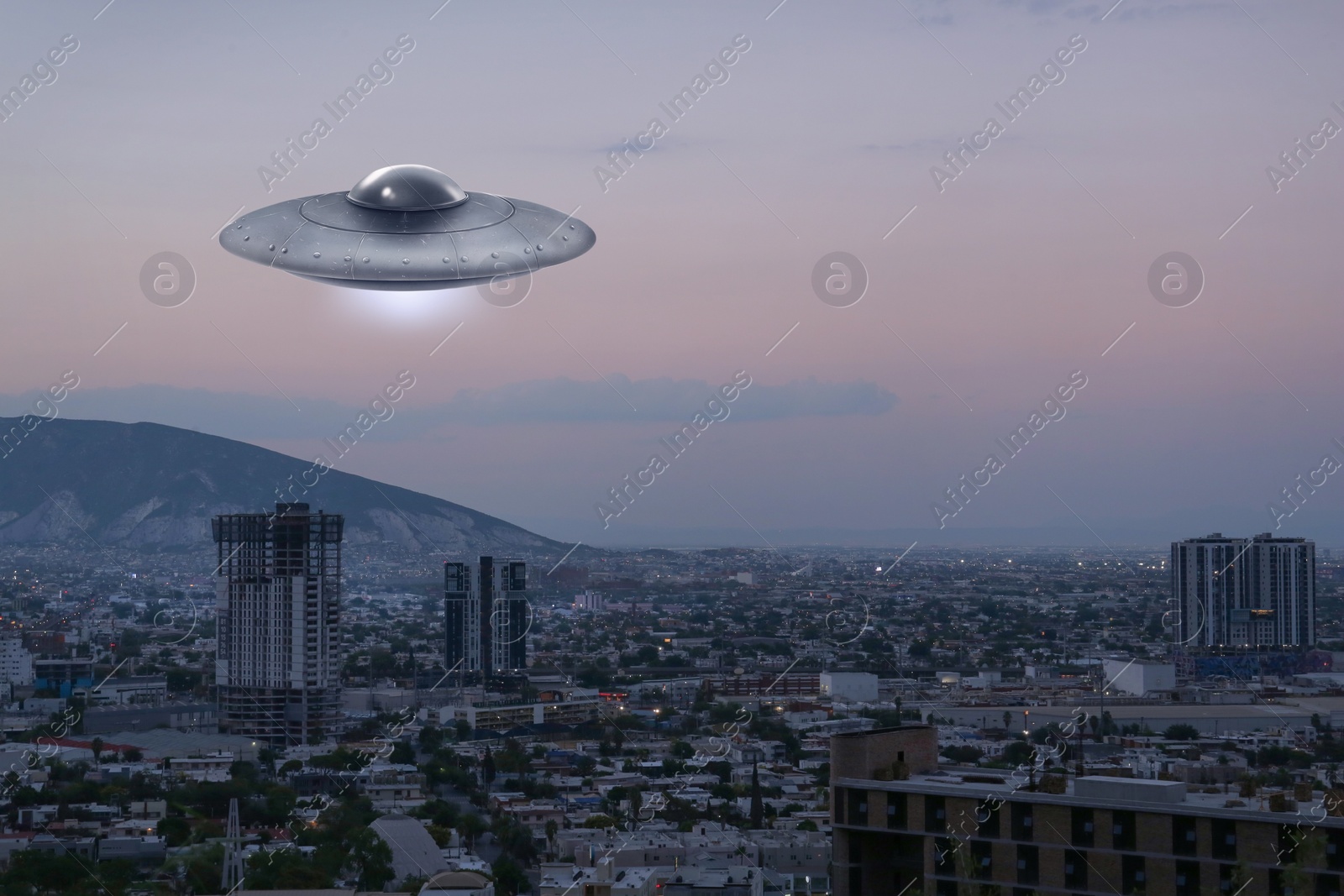 Image of Alien spaceship flying over city in morning. UFO, extraterrestrial visitors
