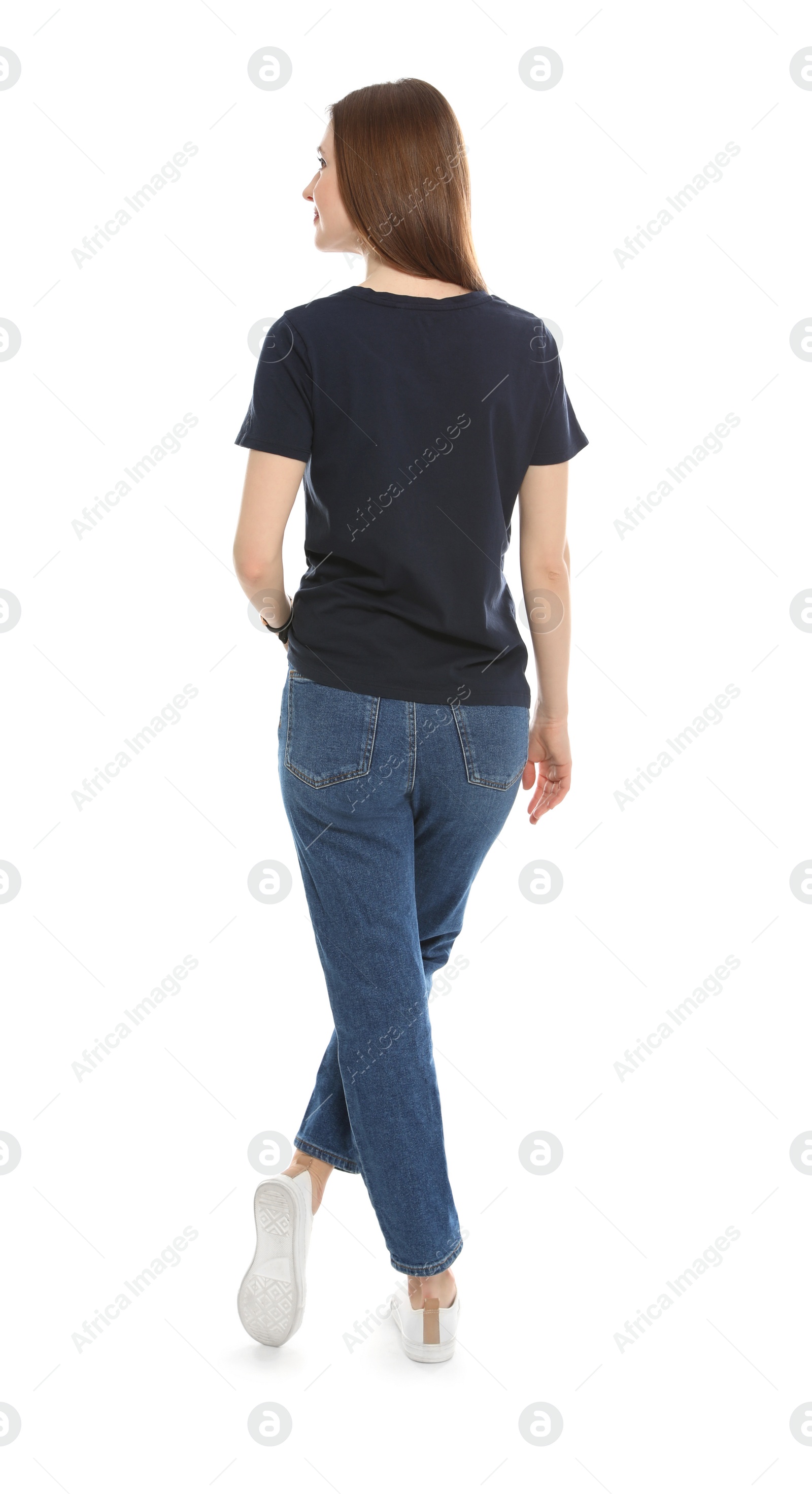 Photo of Young woman in t-shirt on white background. Mock up for design