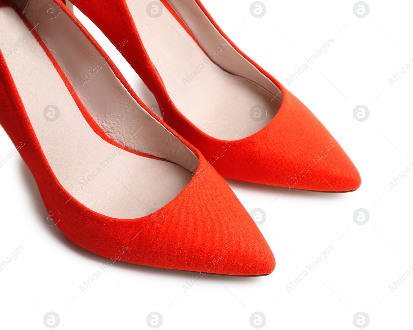 Photo of Stylish red female shoes on white background, closeup