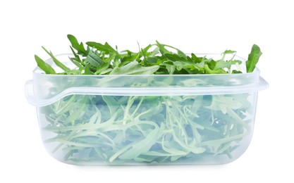 Photo of Fresh arugula in plastic container isolated on white