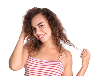 Photo of Portrait of beautiful laughing African-American woman on white background