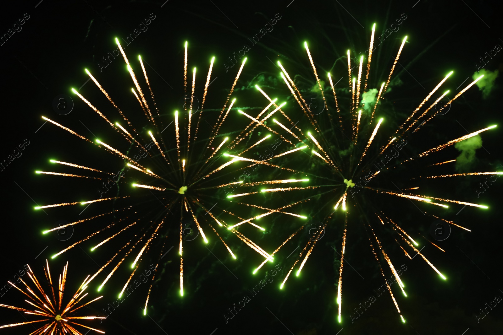 Photo of Beautiful bright fireworks lighting up night sky