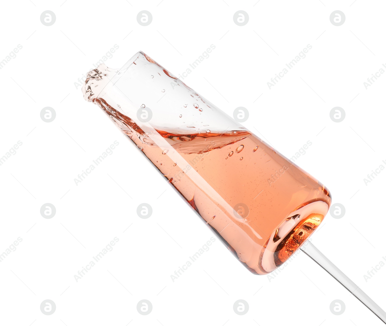 Photo of Glass of rose champagne isolated on white