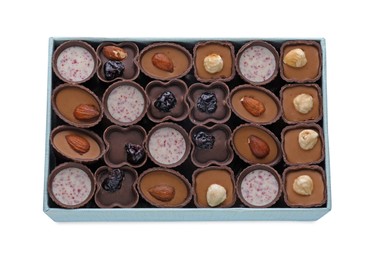 Photo of Box of delicious chocolate candies isolated on white, top view