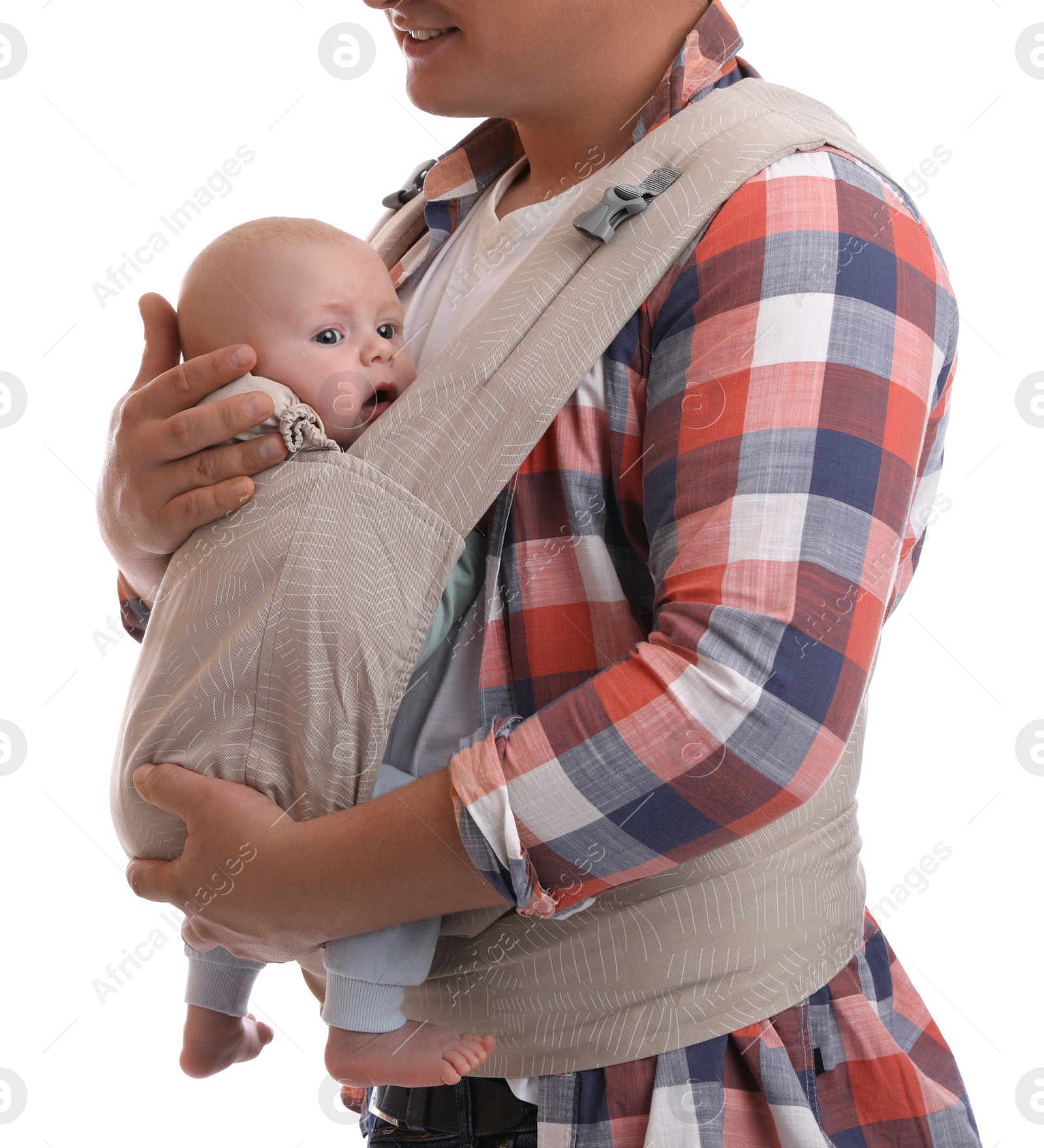 Photo of Father holding his child in baby carrier on white background, closeup