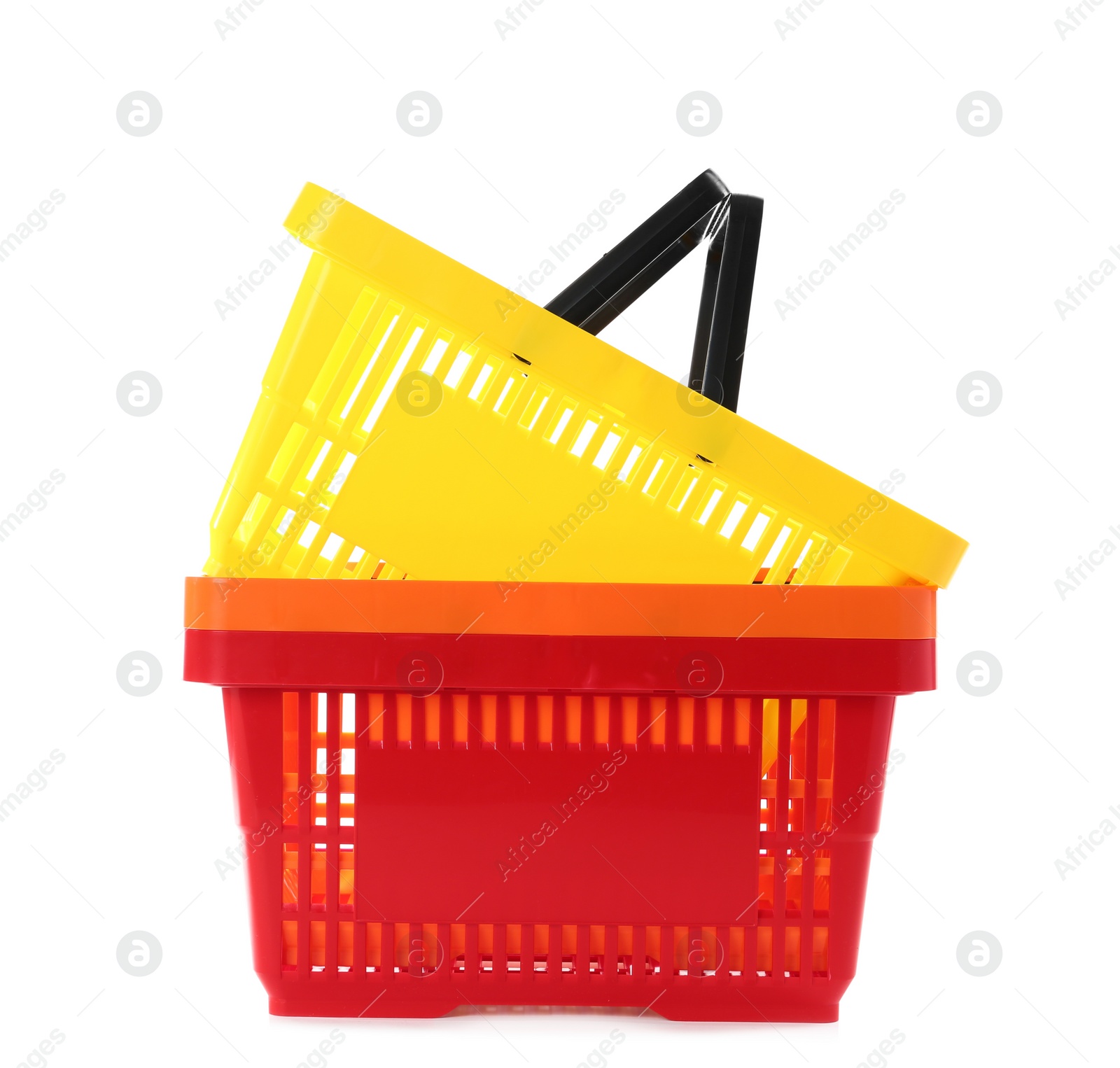 Photo of Colorful plastic shopping baskets on white background