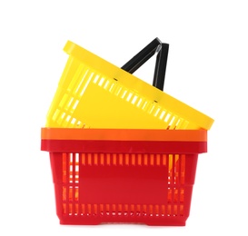 Colorful plastic shopping baskets on white background