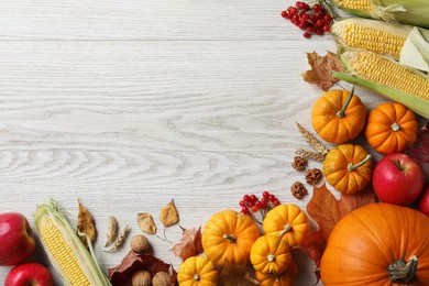 Thanksgiving day. Flat lay composition with pumpkins on white wooden table, space for text