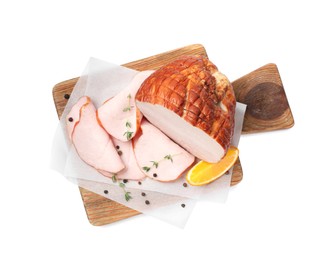 Photo of Delicious cut ham with thyme, orange slice and peppercorns isolated on white, top view