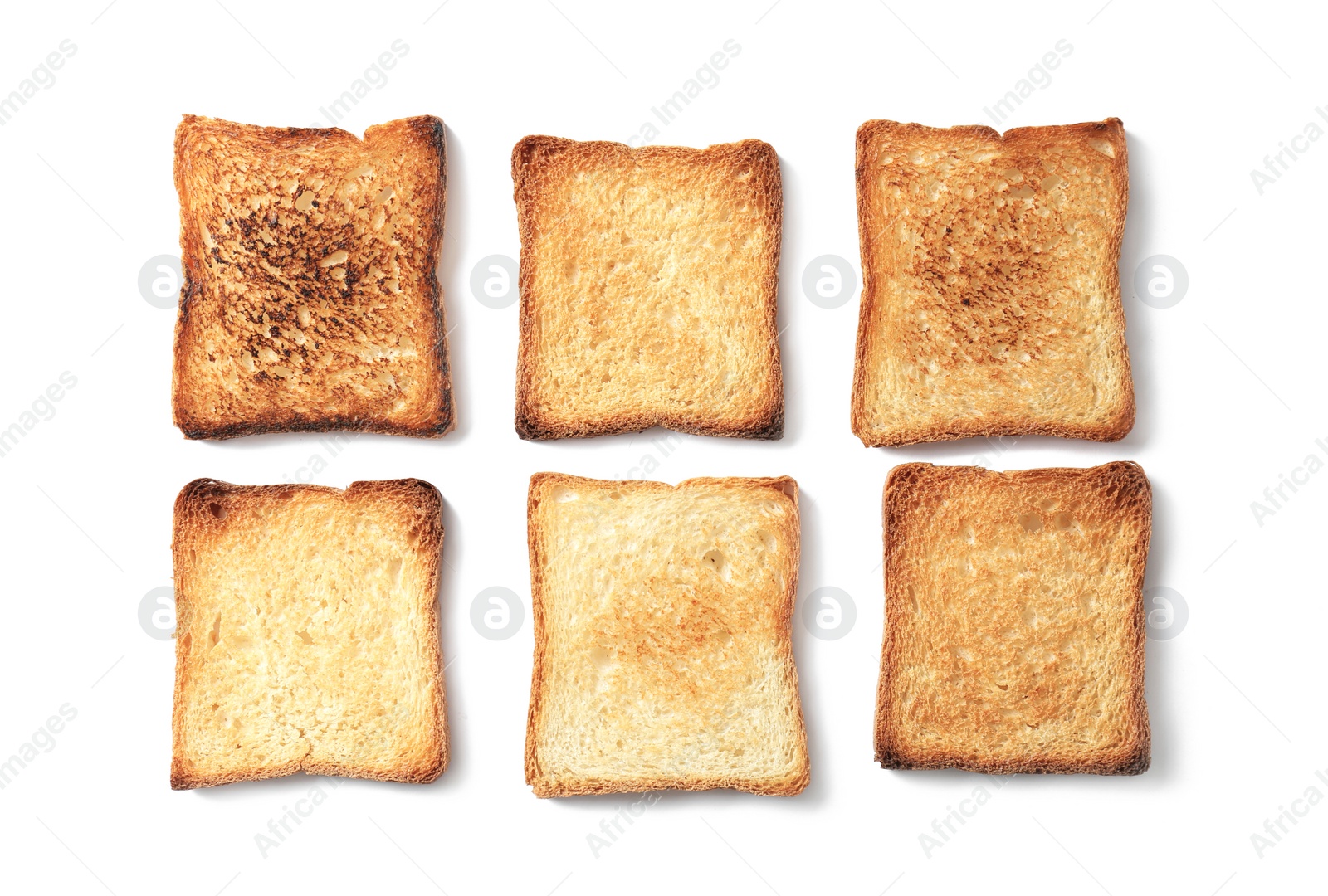 Photo of Toasted bread on white background, top view