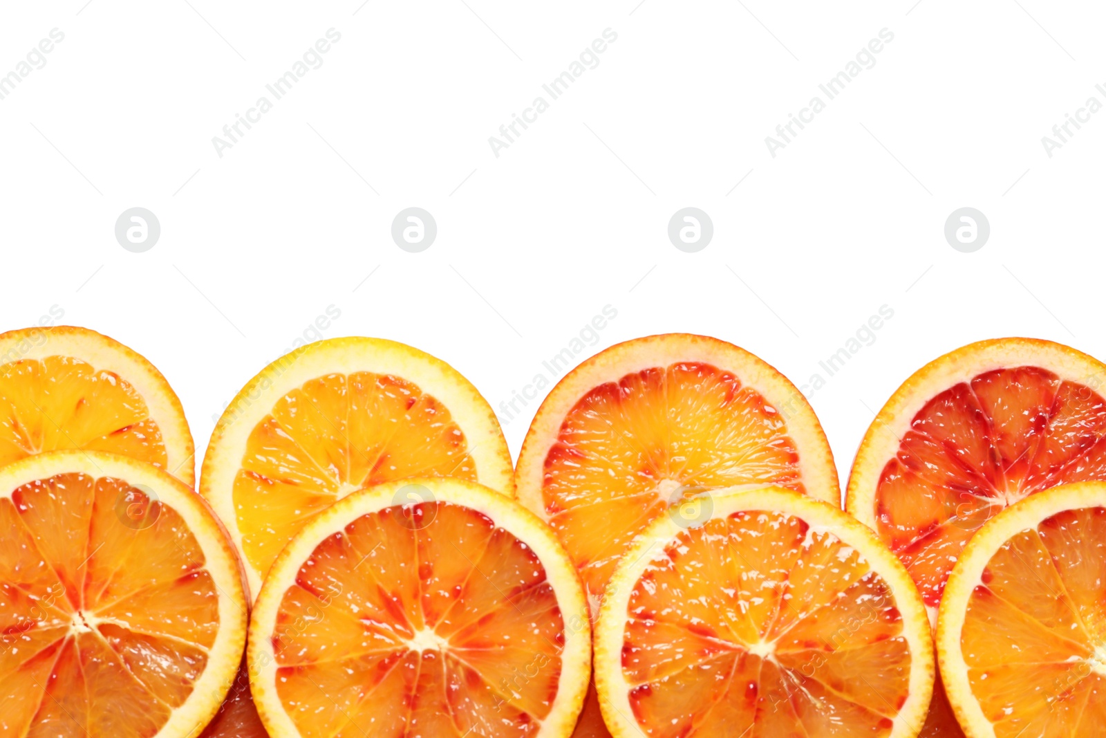 Photo of Juicy blood orange slices on white background, top view. Citrus fruit