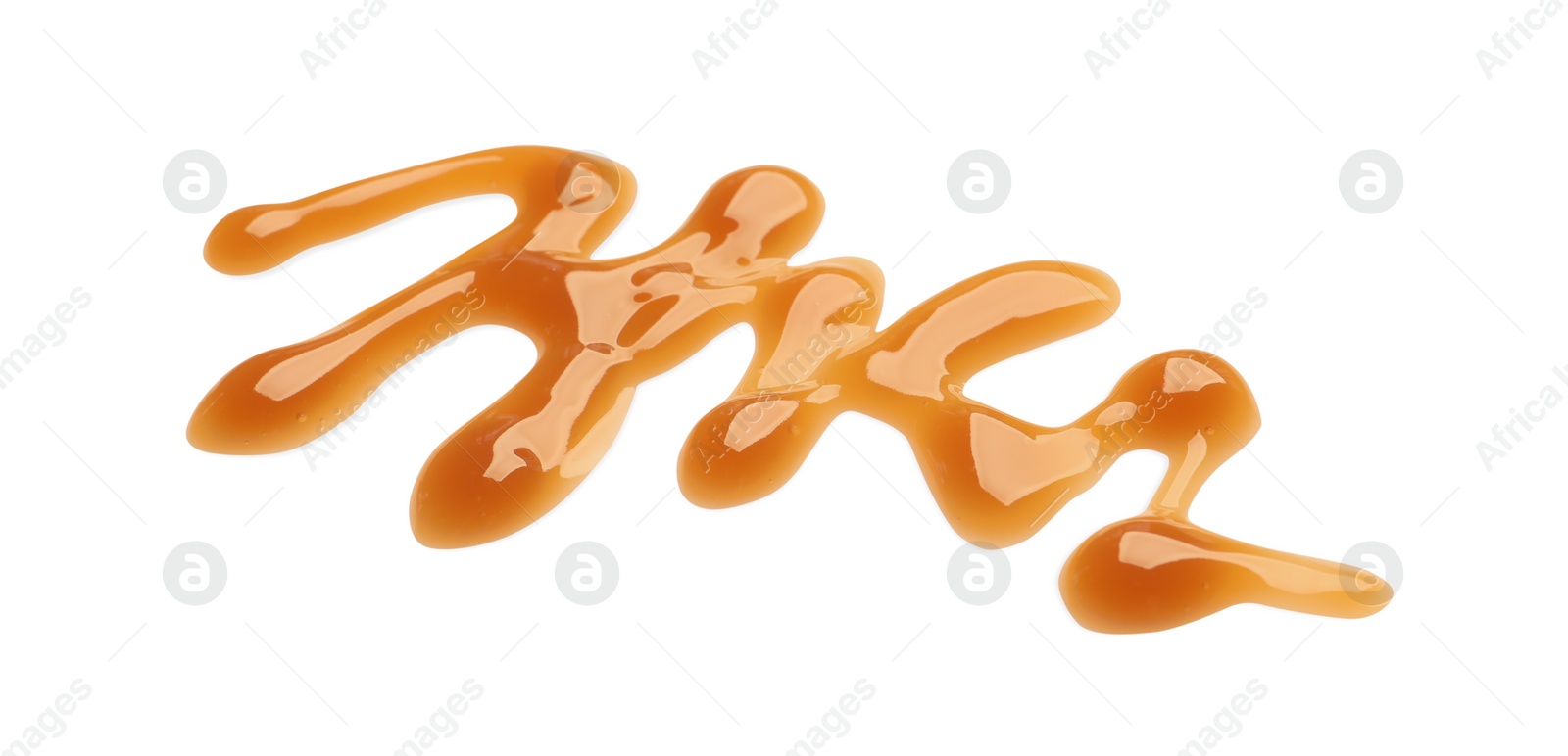 Photo of Stroke of sweet caramel sauce isolated on white