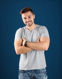 Portrait of handsome man on color background