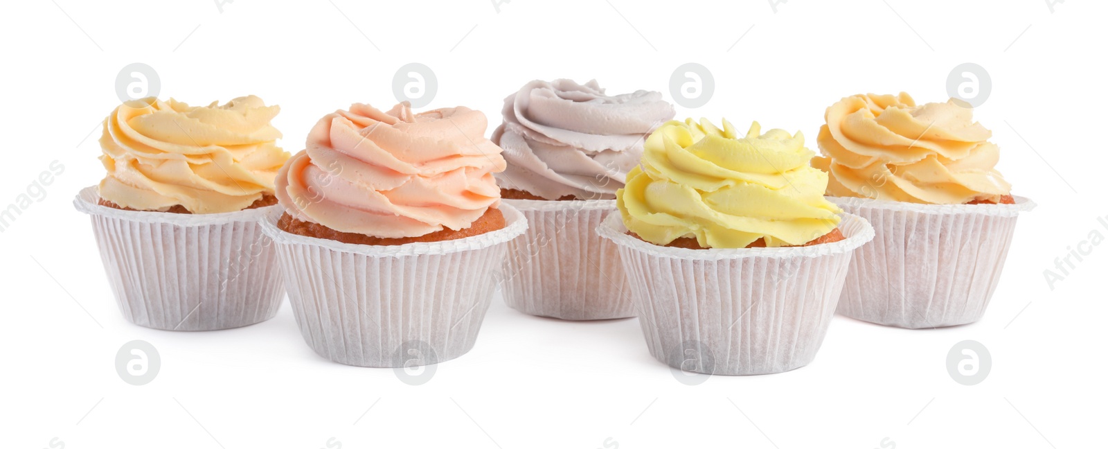 Photo of Tasty cupcakes with cream isolated on white