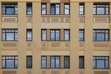 Photo of Wall of vintage building with beautiful windows