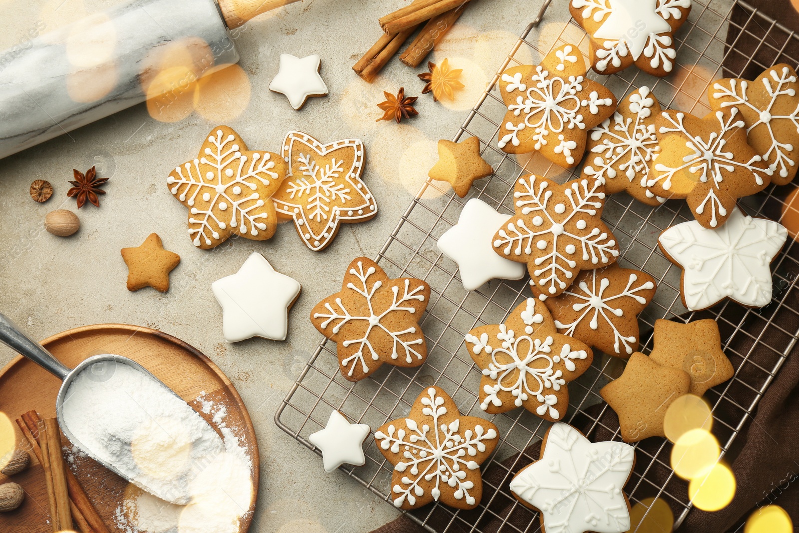 Photo of Flat lay composition with tasty Christmas cookies and spices on light table