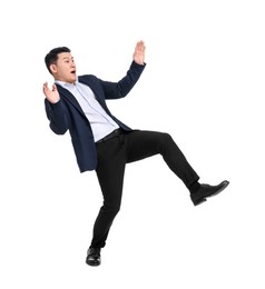 Businessman in suit posing on white background