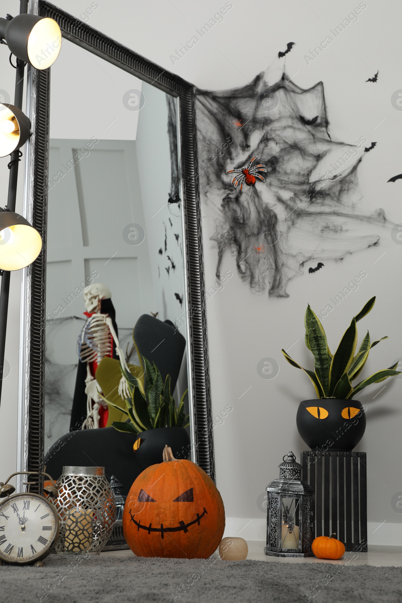 Photo of Modern room decorated for Halloween. Festive interior