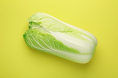 Photo of Fresh ripe Chinese cabbage on green background, top view