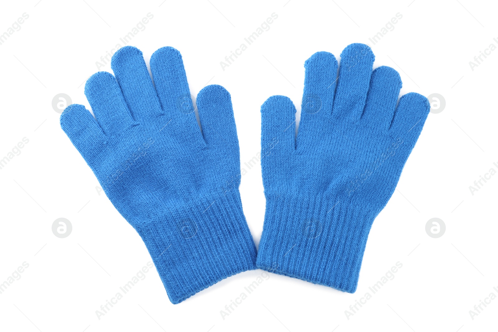 Photo of Blue woolen gloves on white background, top view. Winter clothes