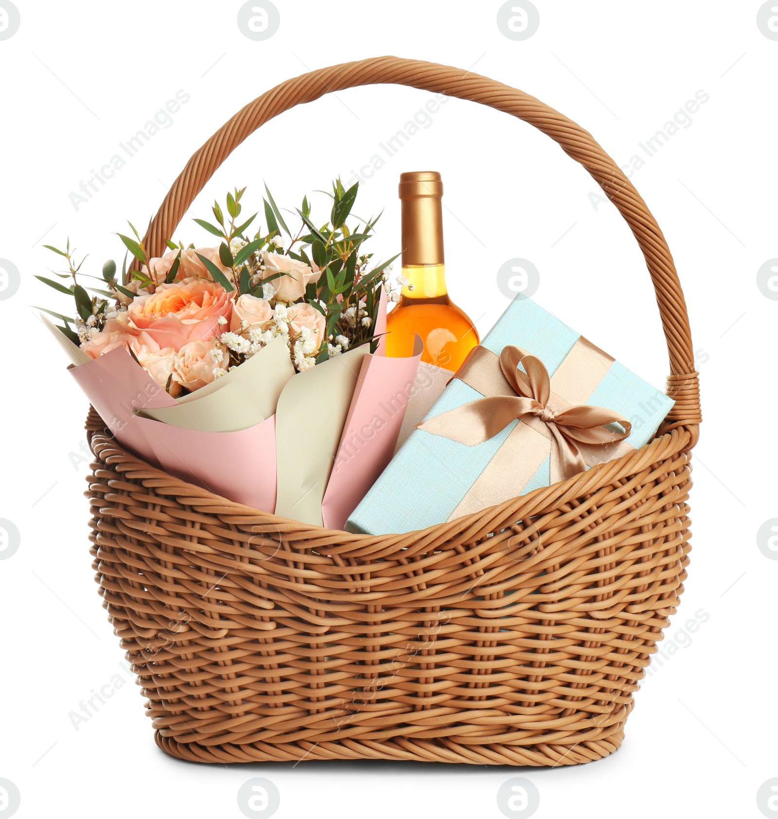 Photo of Wicker basket with different gifts on white background