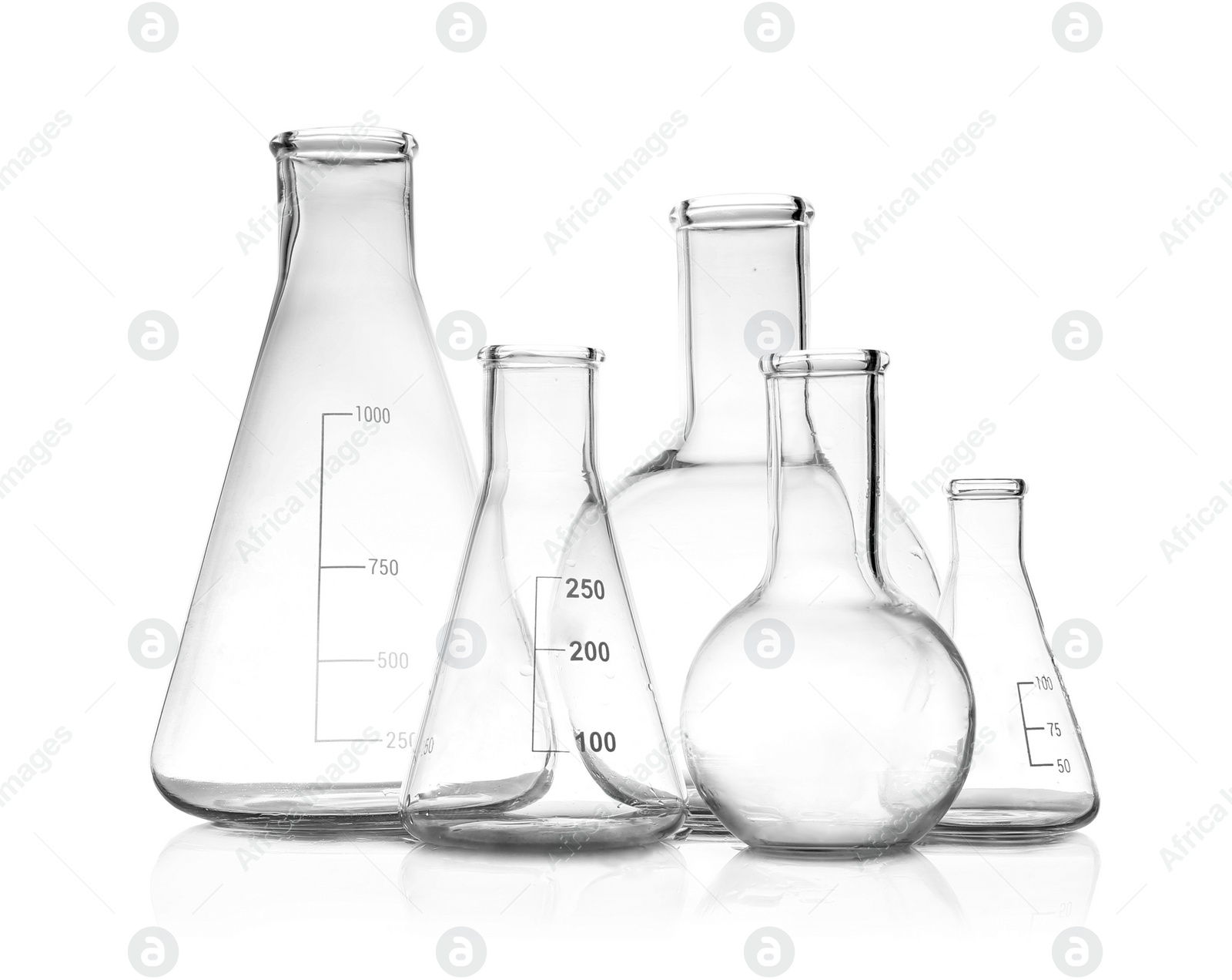 Photo of Set of empty laboratory glassware on white background