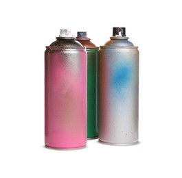 Used cans of spray paints on white background