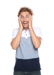 Photo of Young man in casual clothes posing on white background