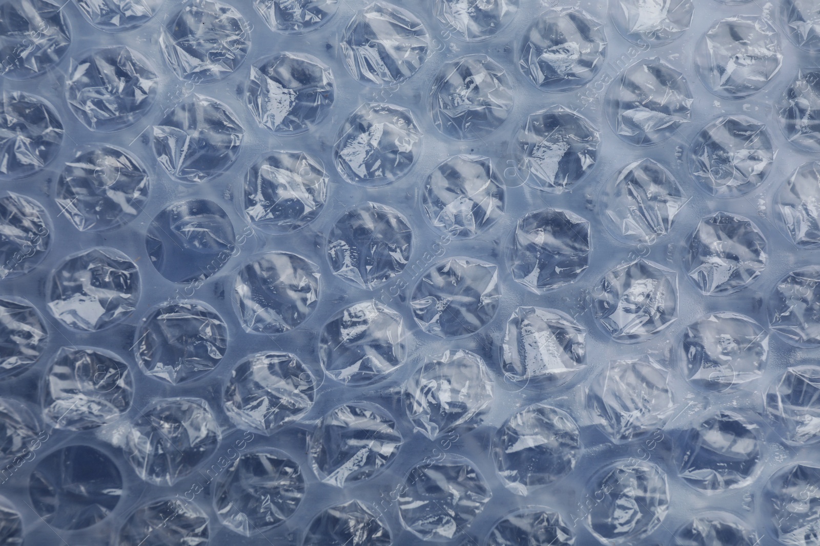 Photo of Texture of bubble wrap as background, top view