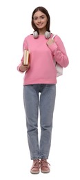 Photo of Teenage student with backpack, headphones and books on white background