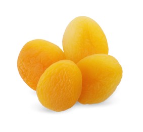 Photo of Pile of tasty apricots on white background, top view. Dried fruits