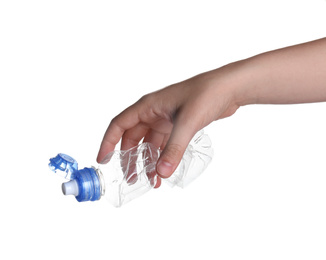 Photo of Woman holding crumpled bottle on white background, closeup. Plastic recycling