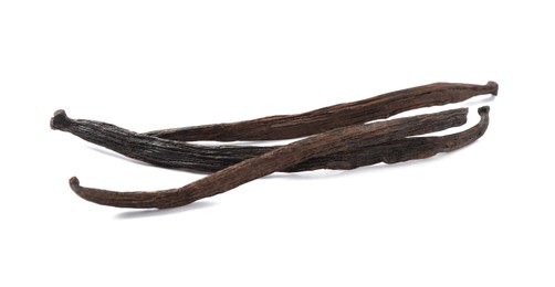 Photo of Dried aromatic vanilla sticks on white background