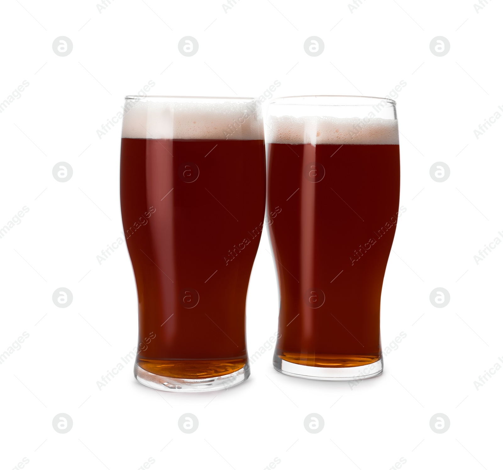 Photo of Glasses of delicious kvass isolated on white