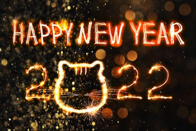 Image of Bright text Happy New 2022 Year made of firework on dark background. Greeting card design