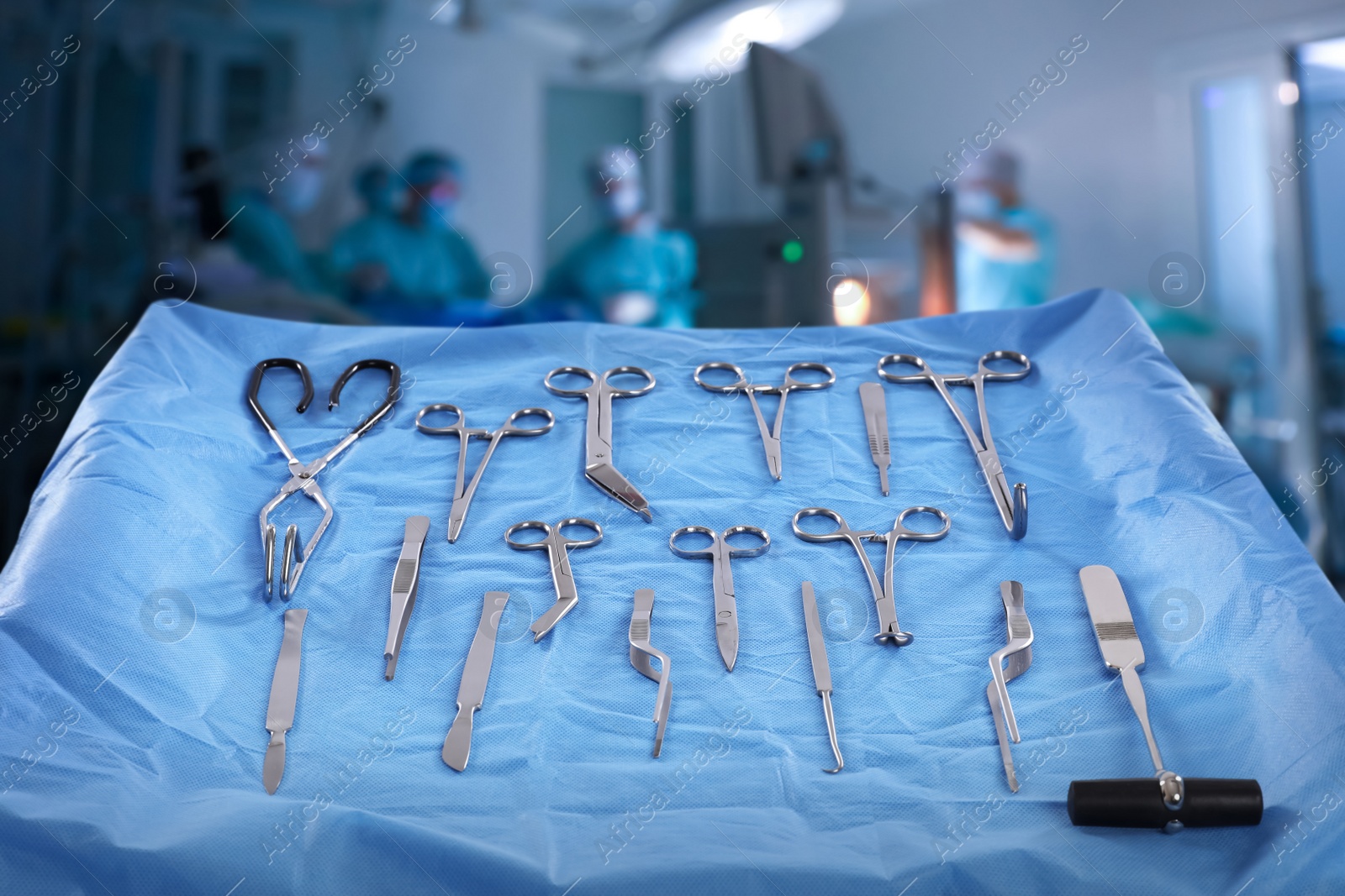 Image of Different surgical instruments on table in operating room