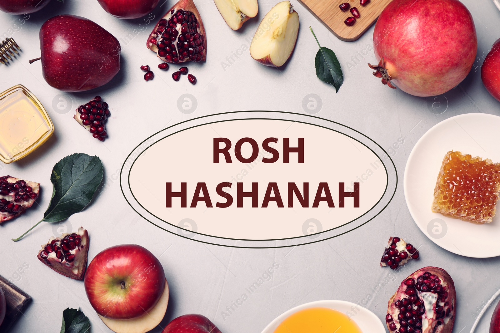 Image of Frame of honey, apples and pomegranates on light table, flat lay. Rosh Hashanah holiday